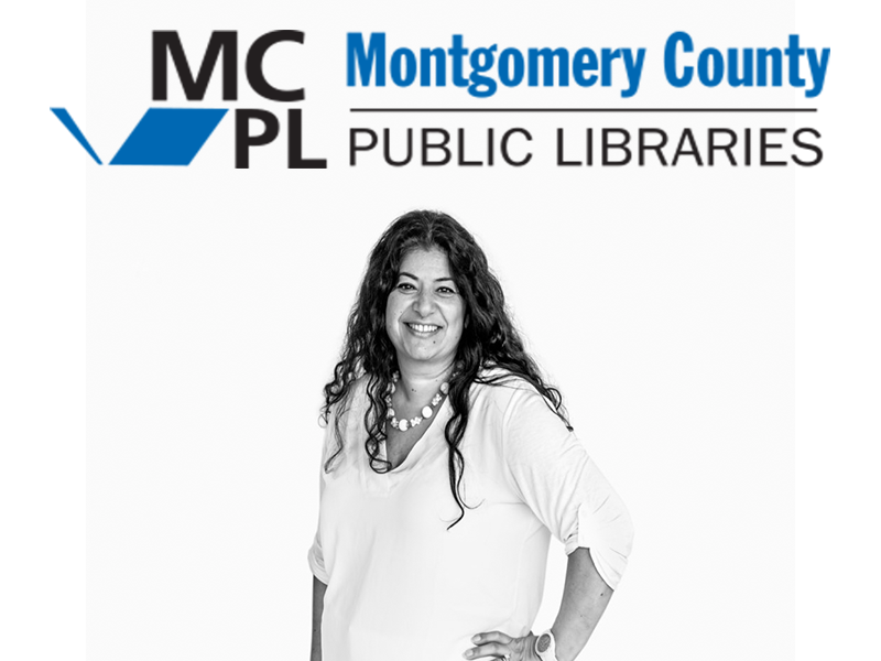 A woman with long curly hair, wearing a white blouse and a necklace, smiling against a backdrop that displays the Montgomery County Public Libraries logo.